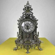 orologio da camino in metallo