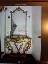console dorata con specchio