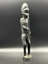Statua suonatore di flauto