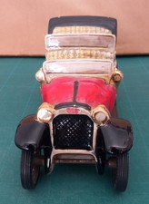 Bottiglia in ceramica raffigurante AUTOMOBILE ITALA 1912. Cm. 25x10. Anni '70