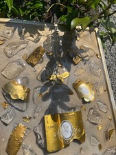 Quadro con bottiglia rotta Cristal champagne 