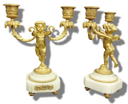 Coppia portacandele putti - portacandele,