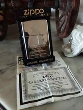 Accendino anatra penna barca a