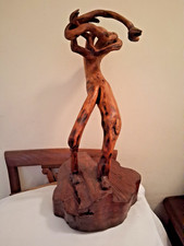 SCULTURA LEGNO D'ULIVO OPERA