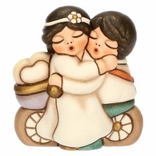 Sposini Thun su bicicletta