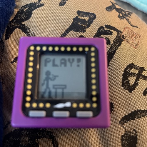 Radica cube world purple dart - world,