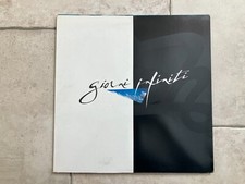 Pooh _ Giorni Infiniti _ Vinile LP 33giri 12" WHITE + Spilla _ 1986 Italy 1st