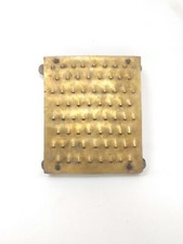 Grattugia antica in ottone