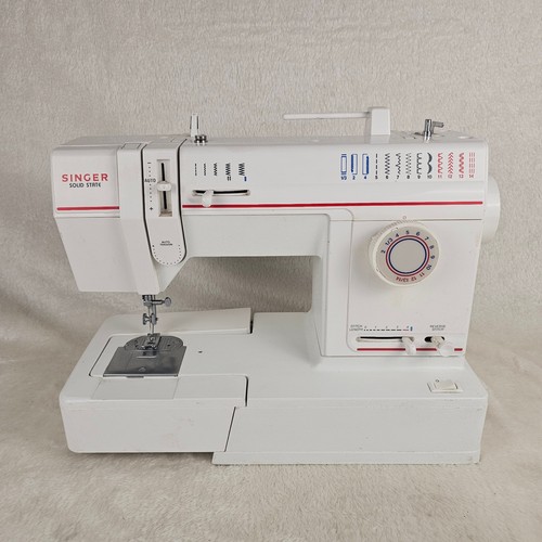 Singer solid state sewing - singer,