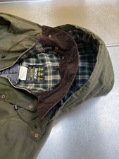 Giacca e cappuccio cerati