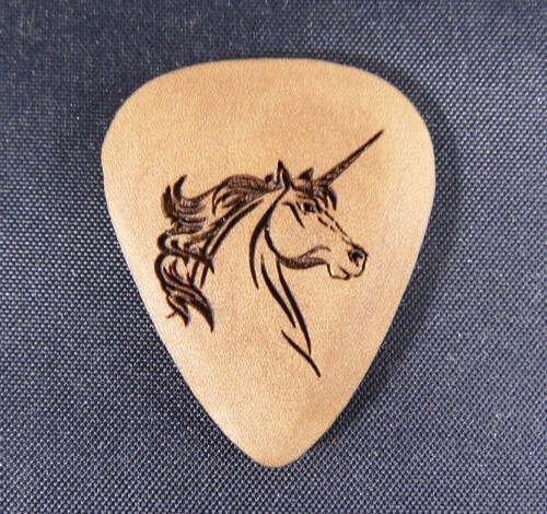 Plettro per chitarra - , in