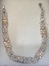 cintura donna vintage dorata con maglie floreali - stile anni '80 elegante