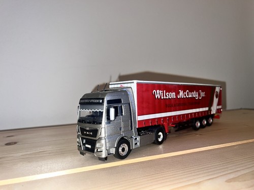 Conrad man tgx - man,