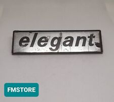 AUTOBIANCHI A 112 SCRITTA ELEGANT GRIGIA LATERALE BADGE RICAMBIO AUTO D'EPOCA 