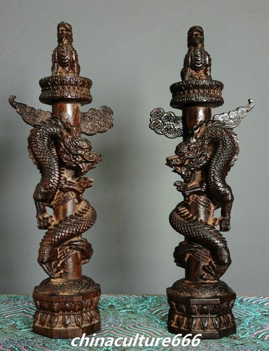 Coppia statue colonna bestia