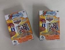 Set di 2 microfigure e fumetti