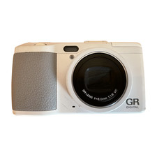 Caricabatteria fotocamera