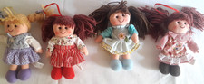 4 bambole di pezza con