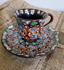 Antica tazza e piattino da
