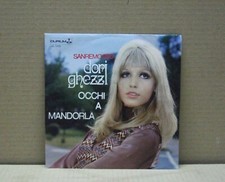 Dori ghezzi occhi a mandorla - dori,