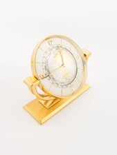 Elegante orologio da tavolo con sveglia e indicazione dell'ora mondiale e anello 24 ore anni 60