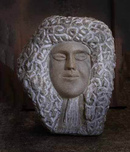 Scultura pietra uomo con - in,