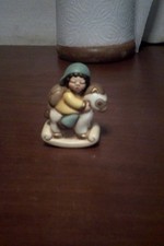 bambino sul dondolo  THUN  vintage  h. cm 7  leggi