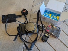 Panasonic Lumix DMC-LX100 12,8 megapixel fotocamera digitale + flash DMW-FL70K, 3 x batterie