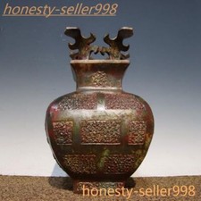 Statua vaso bottiglia tazza