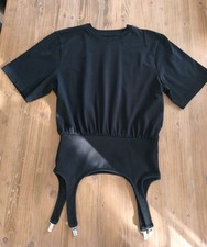 T-shirt con cinturino