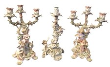 Coppia antichi candelabri e - di,