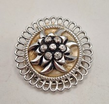 Spilla floreale tono argento