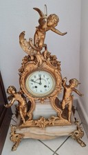 ANTICO OROLOGIO (putto con