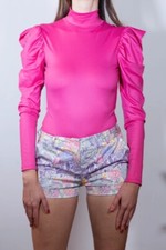 Body fucsia elasticizzato fucsia satinato, con maniche a sbuffo. Come nuovo.