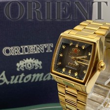 Orologio da polso ORIENT tre stelle oro con scheda di garanzia autentico vintage