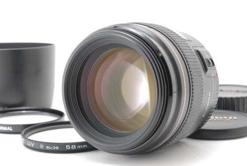 Leggi exc obiettivo canon - [exc+5],