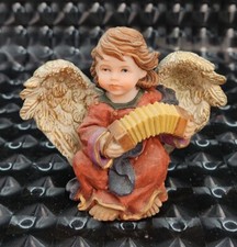 Angelo vintage con fisarmonica