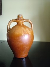Vecchia anfora in terracotta smaltata