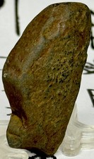 Pietra intagliata effigie di