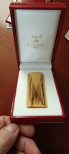 accendino cartier oro