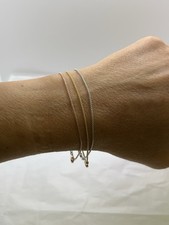 BRACCIALE TRITTICO IN ORO 18KT