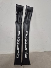 Riempitivo gap tra sedili e tunnel centrale con logo Audi quattro