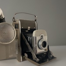 Macchina fotografica terrestre Polaroid vecchia moda completa di custodia. Highlander modello 80b