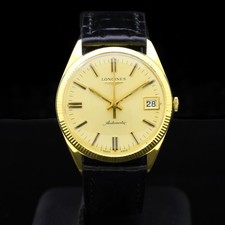 Longines date 70s - kt, gold
