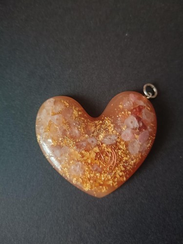 Ciondolo forma cuore con - di,