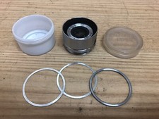 EXC + 5 W/Custodia Konica