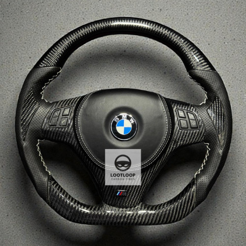 Volante vera fibra di - in,