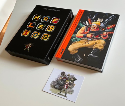 New sealed book metal slug - new, &