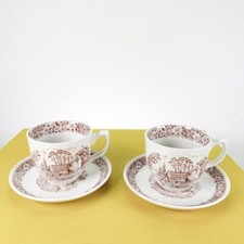 coppia di tazze con piatto