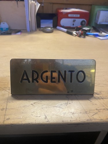 Insegna targa banco argento - da,